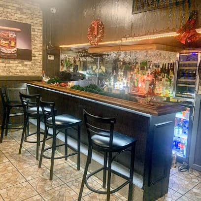 Amanecer Restaurant And Lounge - Dominican Restaurant